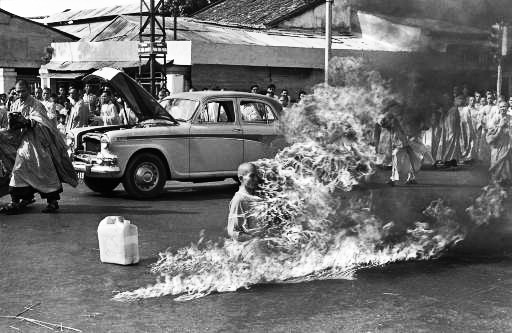 Quang Duc, a Buddhist monk, burns himself to death on a Saigon street June 11, 1963 to protest alleged persecution of Buddhists by the South Vietnamese government.